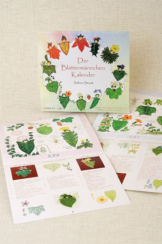 Blättermännchen-Kalender Blättermännchen Kalender mit einzelnen Seiten im Vordergrund