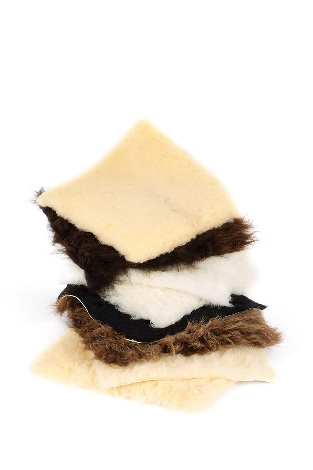 2. Wahl Stuhlauflage quadratisch quadratische zweite Wahl Stuhlauflagen vom Finkhof in verschiedenen Farben gestapelt