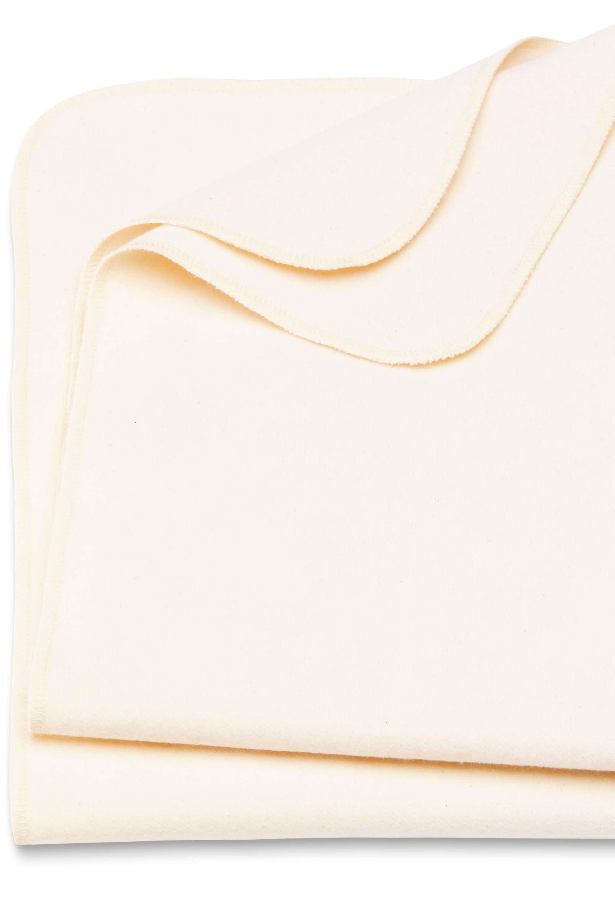 naturweißes Moltontuch aus bio Baumwolle (kbA) zusammengefaltet, Freisteller