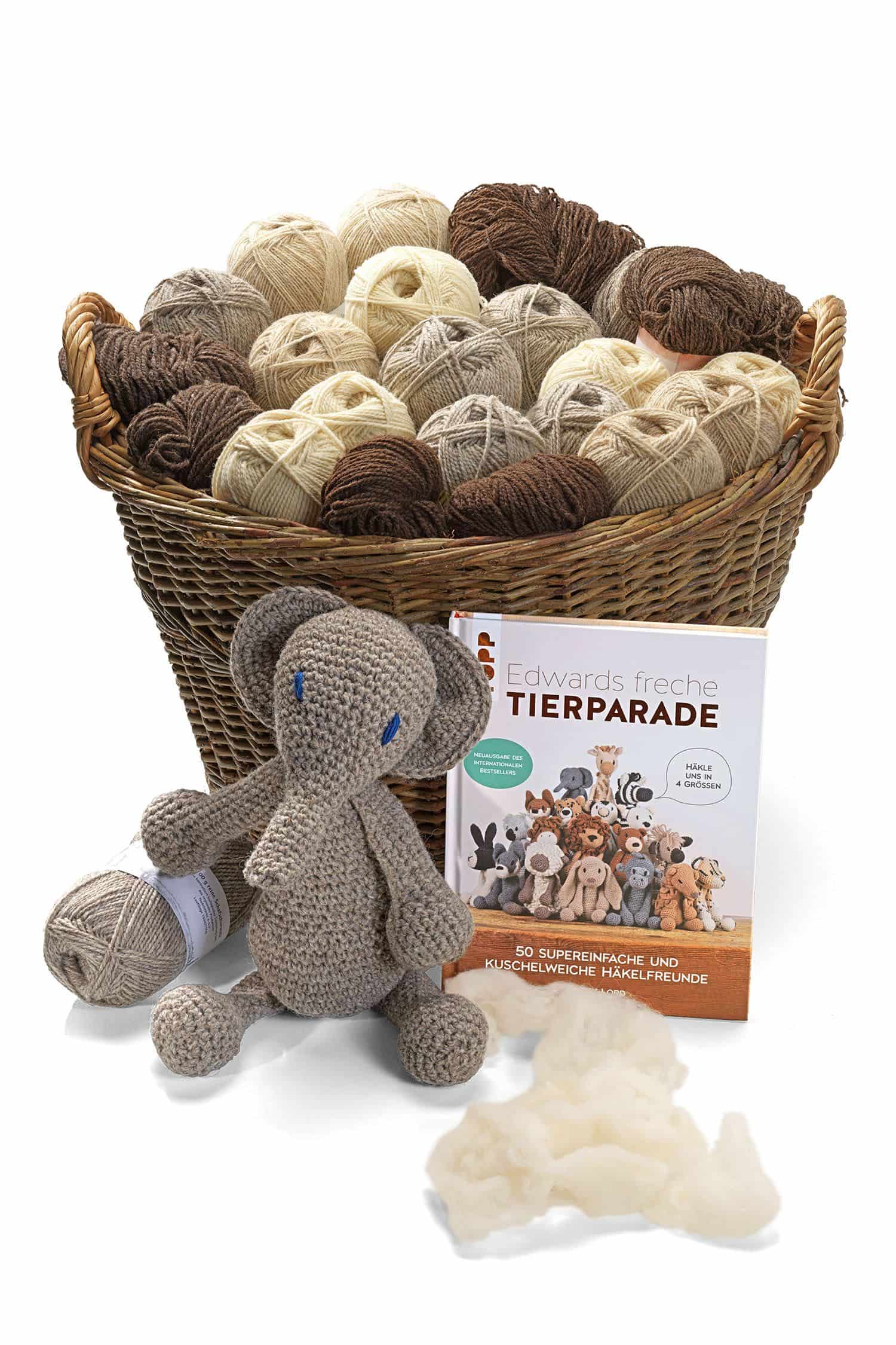 Buch ,,Edwards freche Tierparade" mit gehäckelten Tieren und Finkhof Wolle in Korb