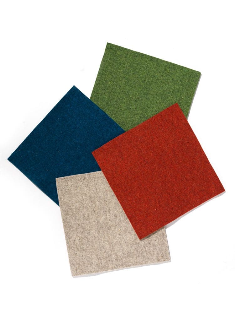 Finkhof-Nadelfilz Finkhof Nadelfilz in vier verschiedenen Farben übereinander gelegt, Freisteller