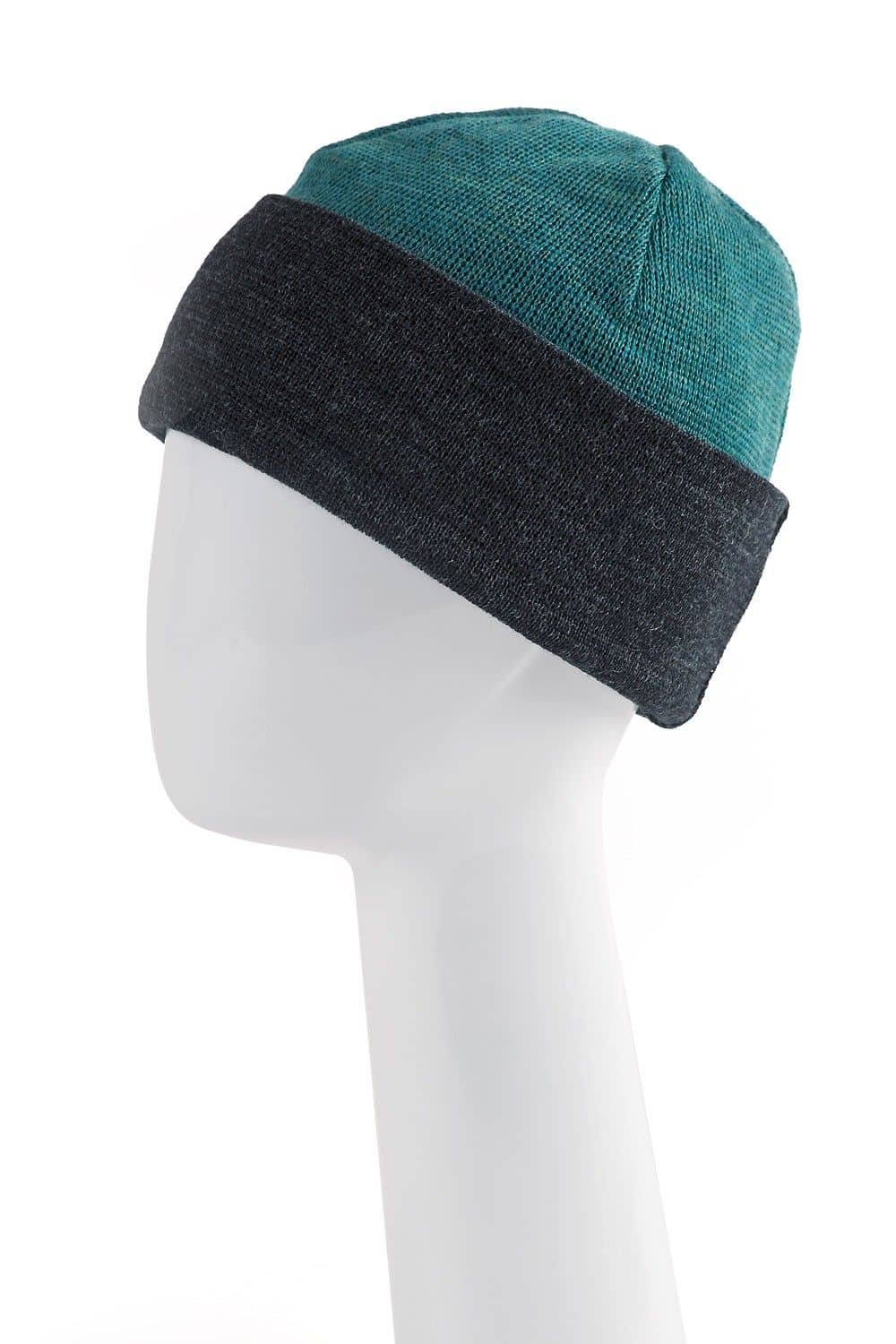 anthrazitgraue/ türkise Finkhof Wendemütze aus bio Wolle (kbT) auf einem Puppenkopf