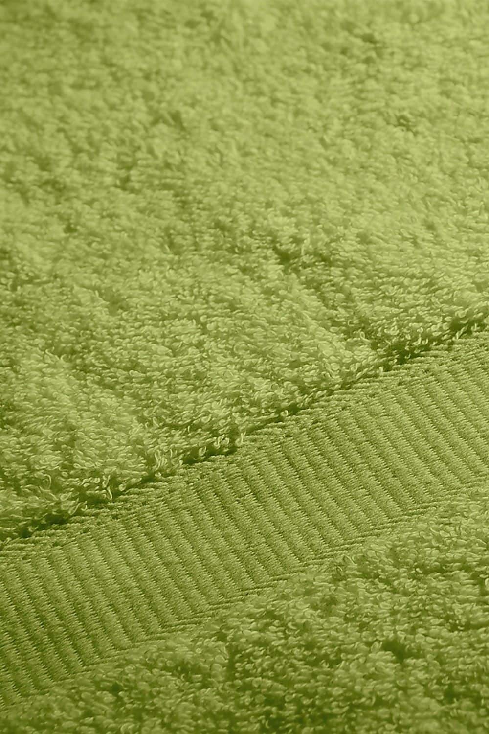 Detailaufnahme von grünem Duschtuch aus bio Baumwolle (kbA) mit 70x140cm