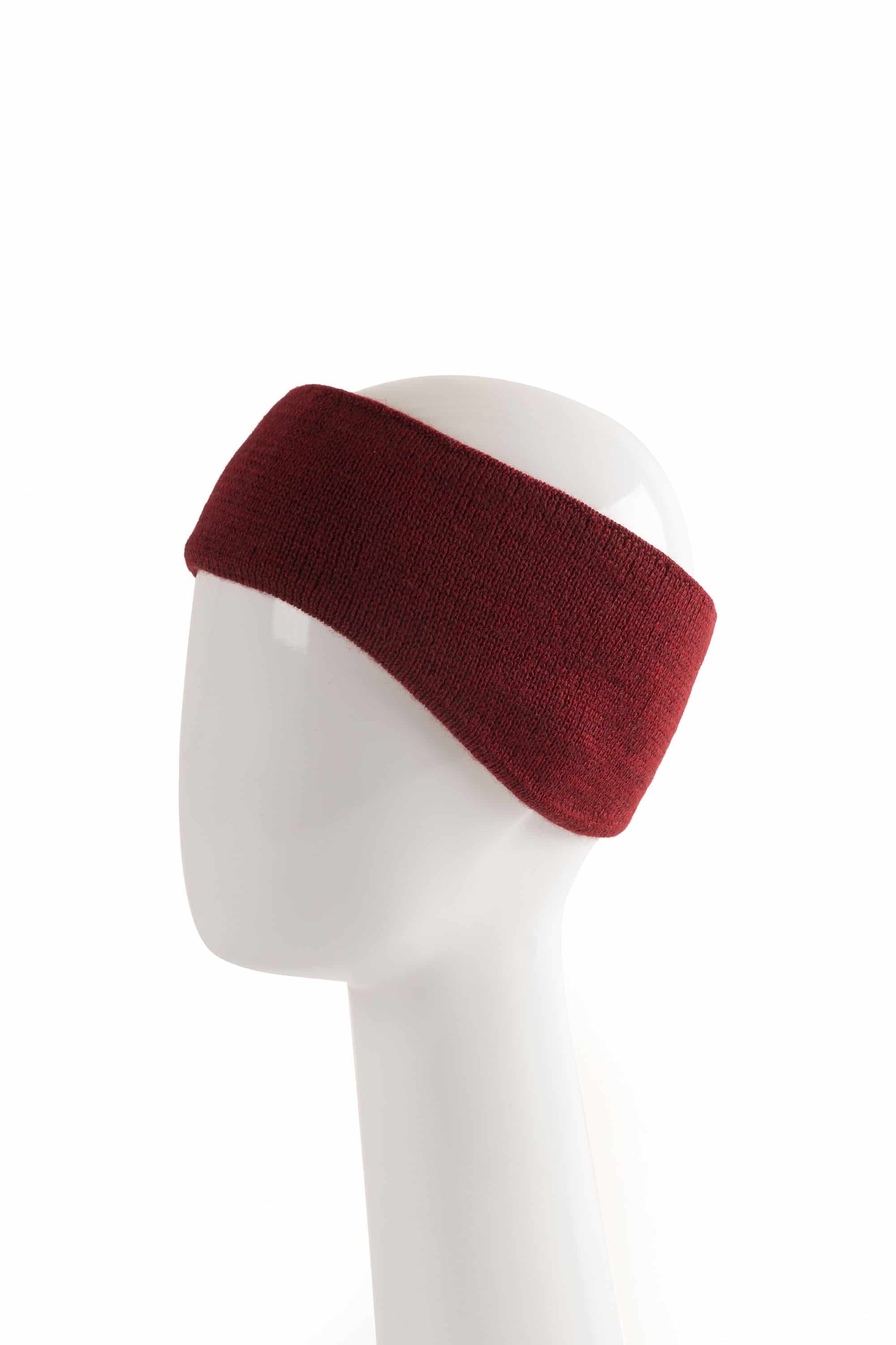 warmes rotes Stirnband vom Finkhof aus bio Wolle (kbT) vom Finkhof auf einem Puppenkopf