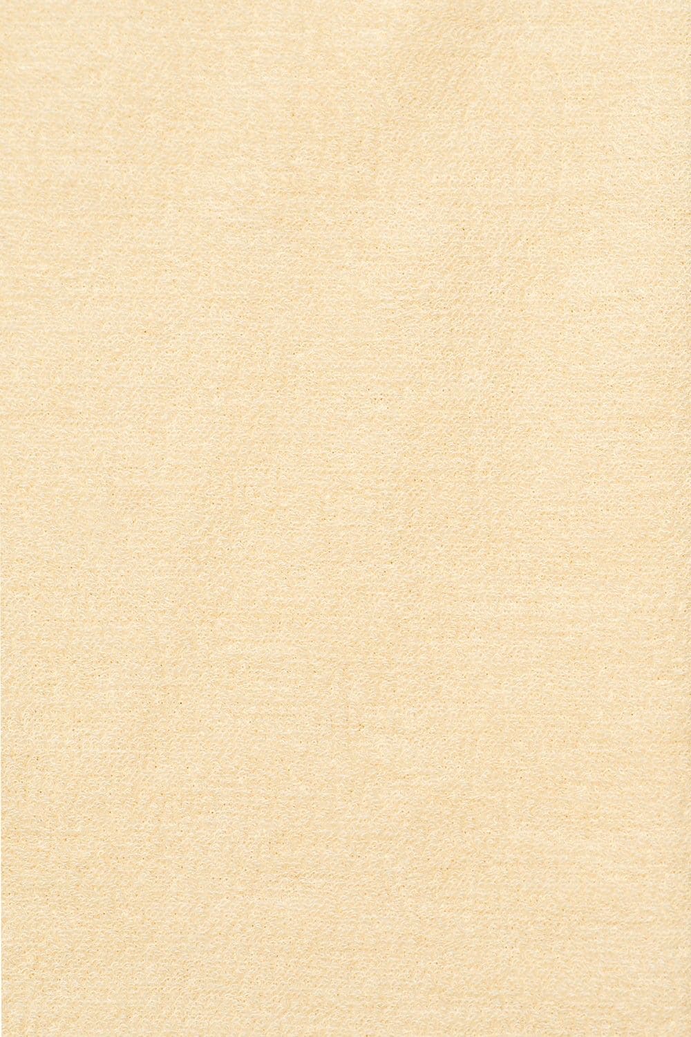 Nahaufnahme vom Stoff des naturweißen Wollfrotte-Schlafanzüge aus bio Wolle (kbT)