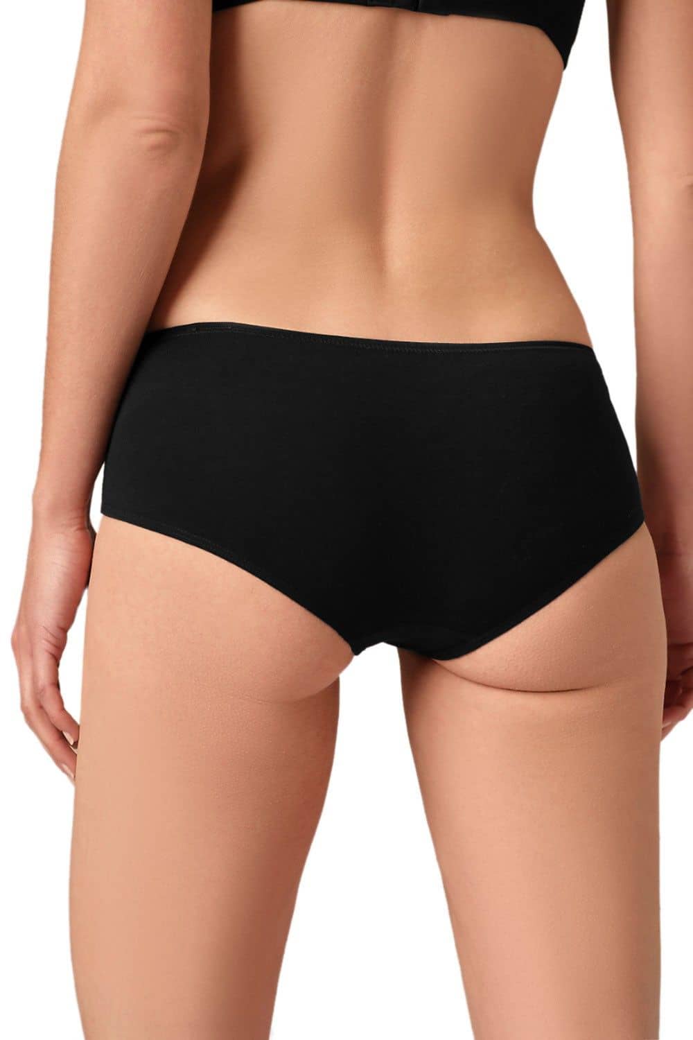 Rückansicht von Model mit schwarzer Panty aus bio Baumwolle (kbA) und Elasthan