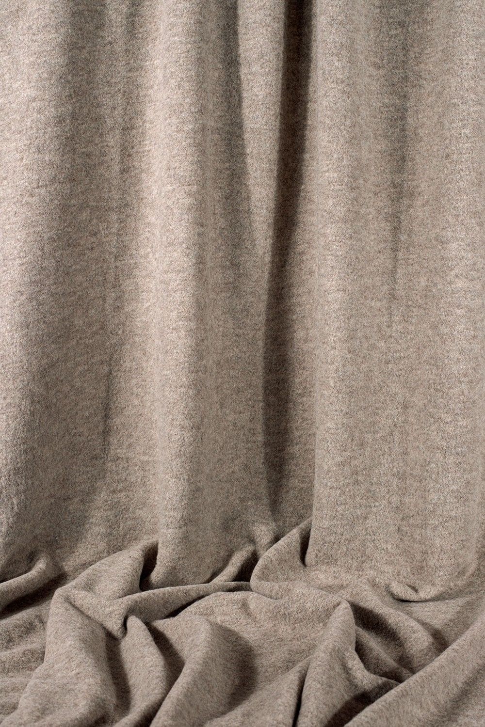 hängender naturmelierter Wollfleece aus bio Wolle (kbT)