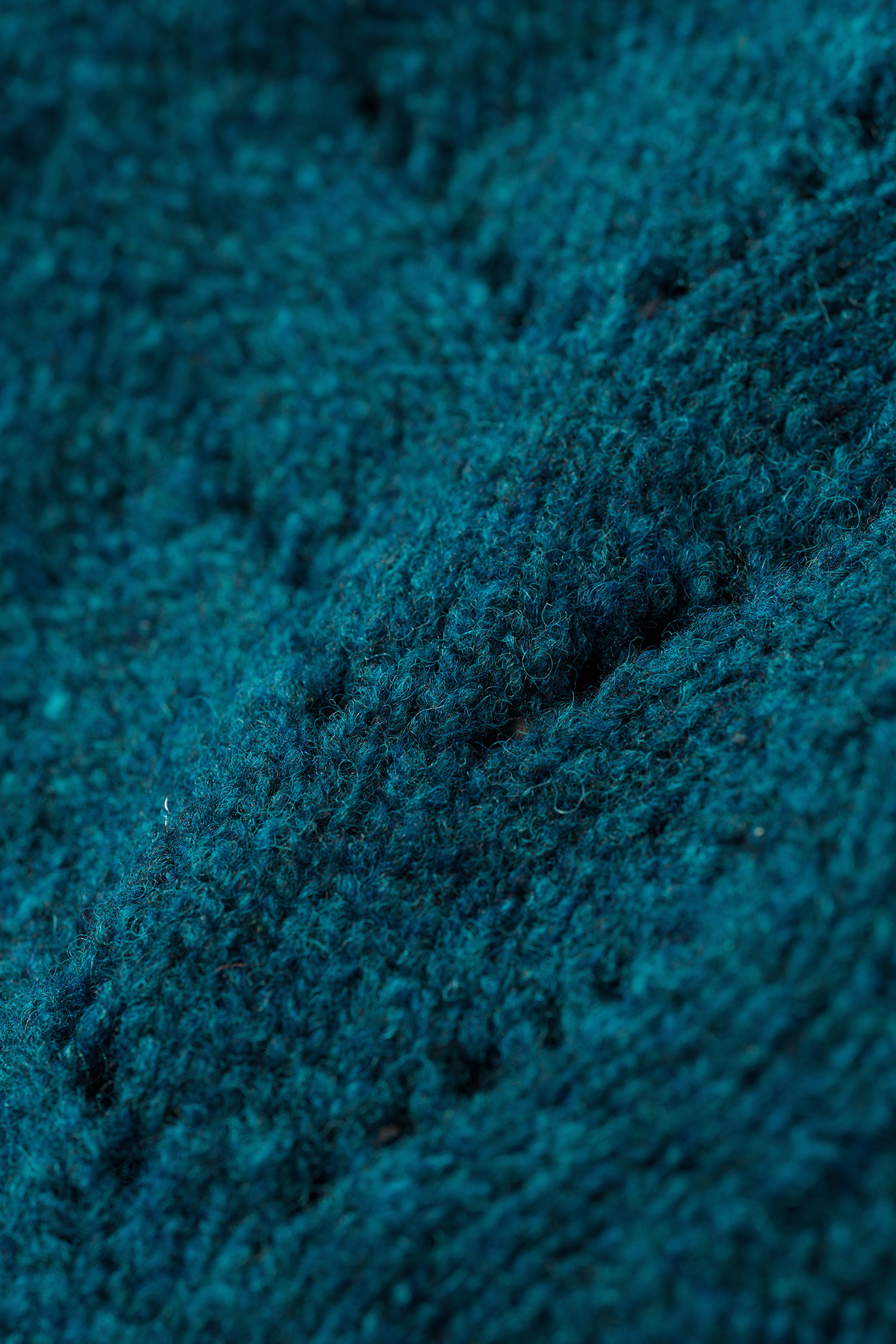 Finkhof-Ajour-Damen-Strickpullunder aus reiner Bio-Schurwolle blauer Strickpullunder für Damen mit Ajourmuster vom Finkhof aus Bio-Wolle (kbT), Freisteller