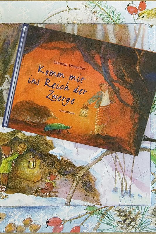 Komm mit ins Reich der Zwerge Buch ,,Komm mit ins Reich der Zwerge" auf bunten Buchseiten