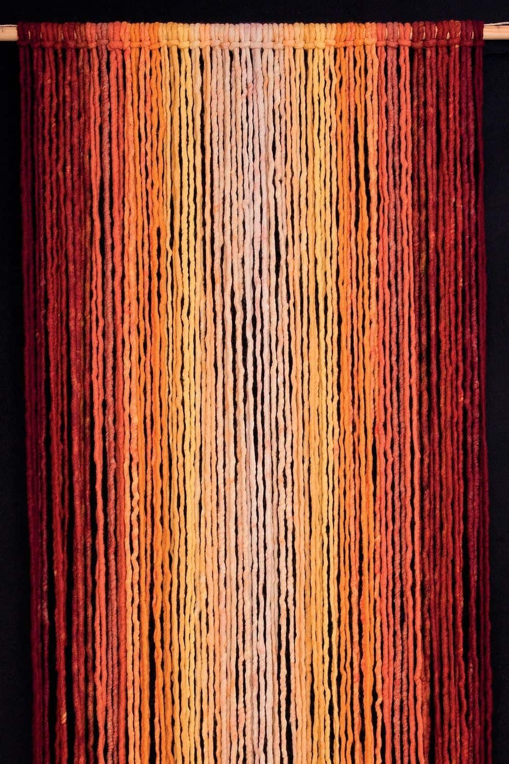 Türvorhang in gelb,rot und orange aus Schurwolle und Jute vom Finkhof