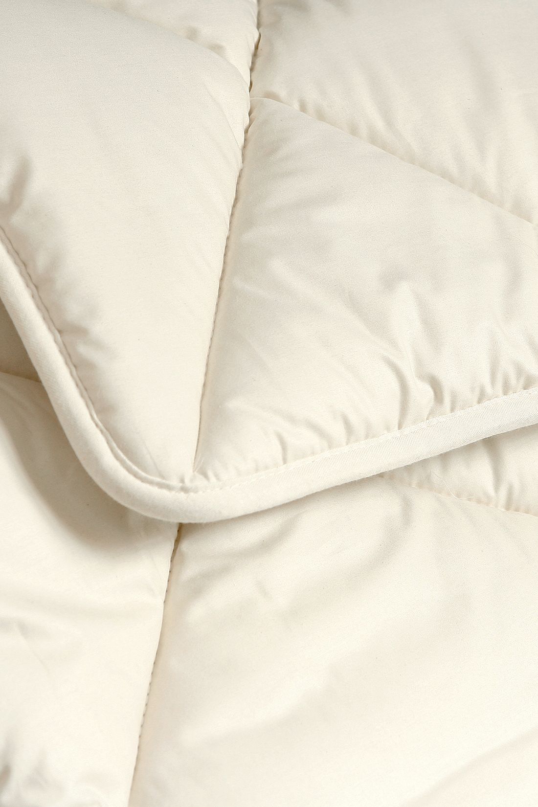 Ecke von der Finkhof Wintersteppdecke aus bio Wolle (kbT) und bio Baumwolle (kbA)