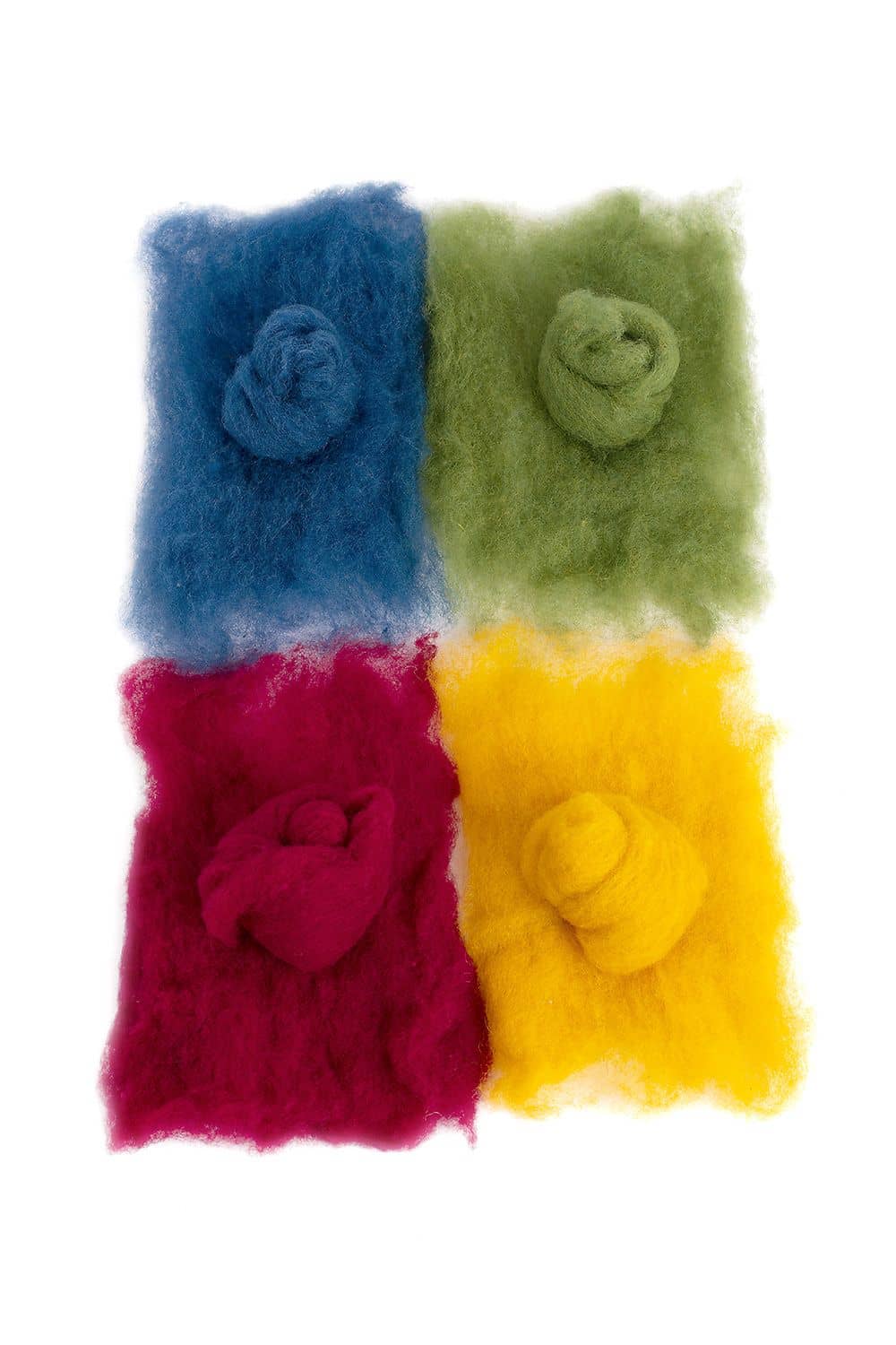 Märchenwolle 100 g einfarbige Märchenwolle in vier verschiedenen Farben aus bio Wolle (kbT) vom Finkhof zu Rechteck gelegt