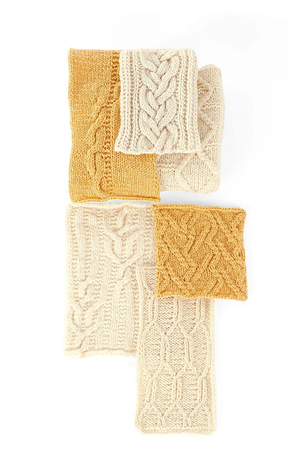 senfgelbe und naturweiße Strickbeispiele für das Buch ,,Die schönsten Zopfmuster"