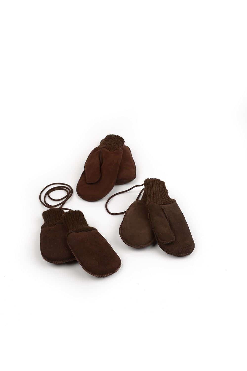 Fellhandschuhe dunkelbraun Gr. 6 drei Paar dunkelbraune Fellhandschuhe, Freisteller