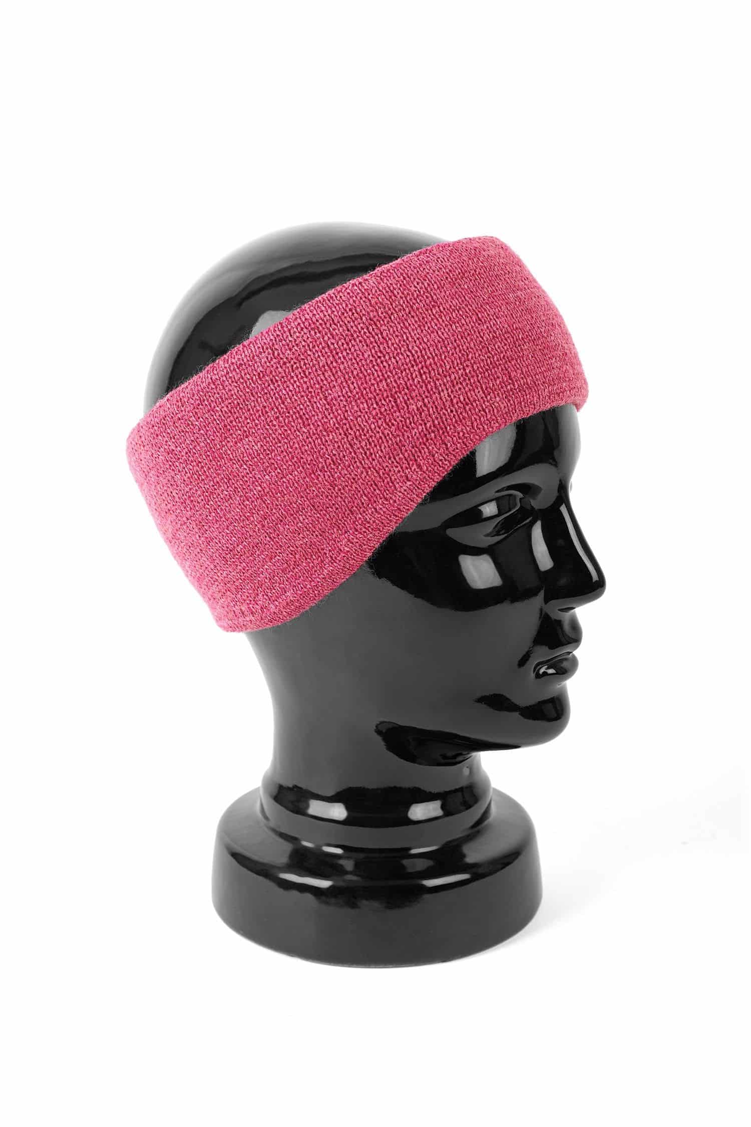 warmes pinkes Stirnband vom Finkhof aus bio Wolle (kbT) vom Finkhof auf weißem Untergrund