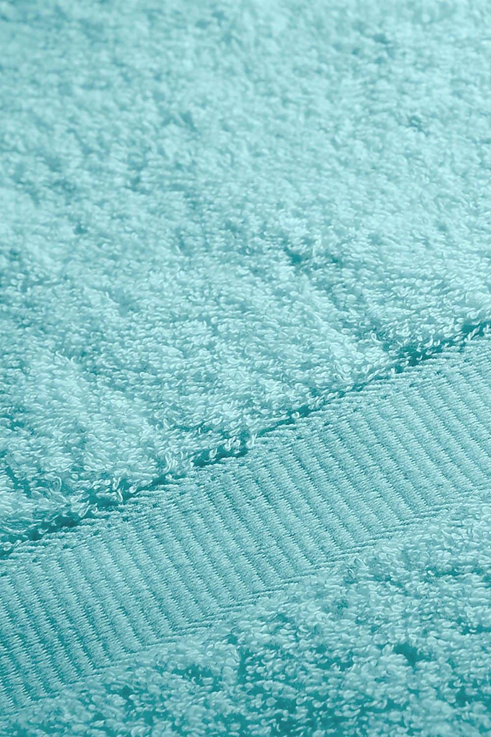 Detailaufnahme von türkisem Duschtuch aus bio Baumwolle (kbA) mit 70x140cm