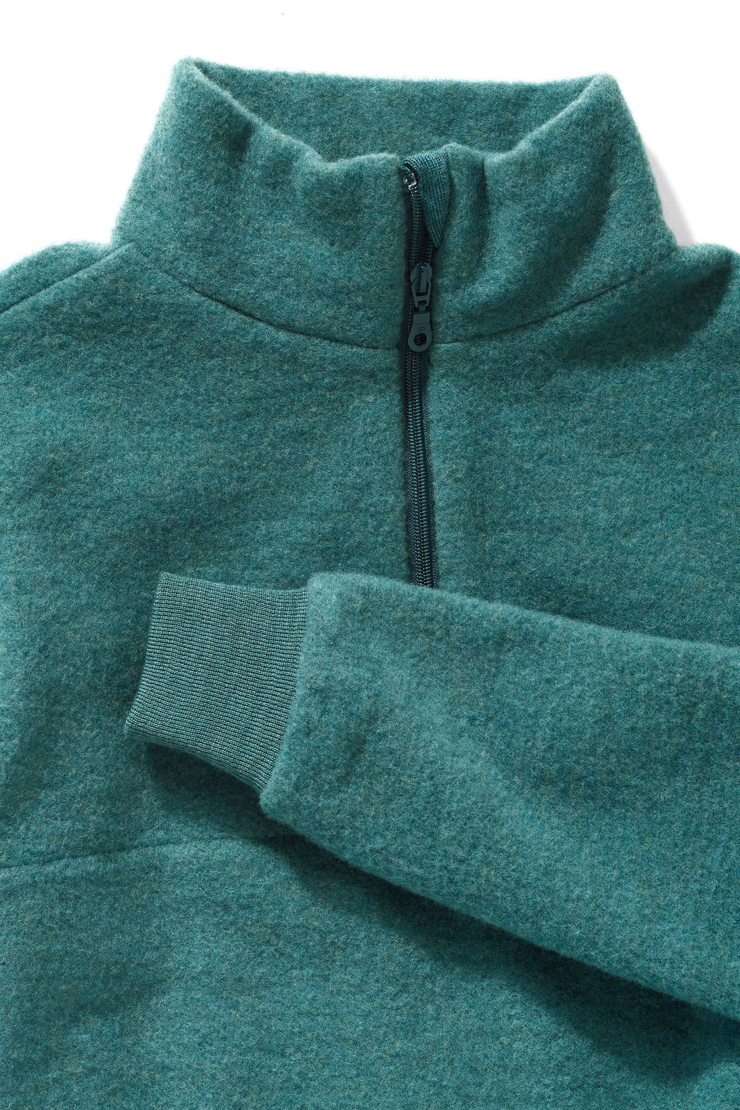 türkiser Wollfleecepulli mit hohem Kragen und Reißverschluss aus bio Wolle (kbT) vom Finkhof