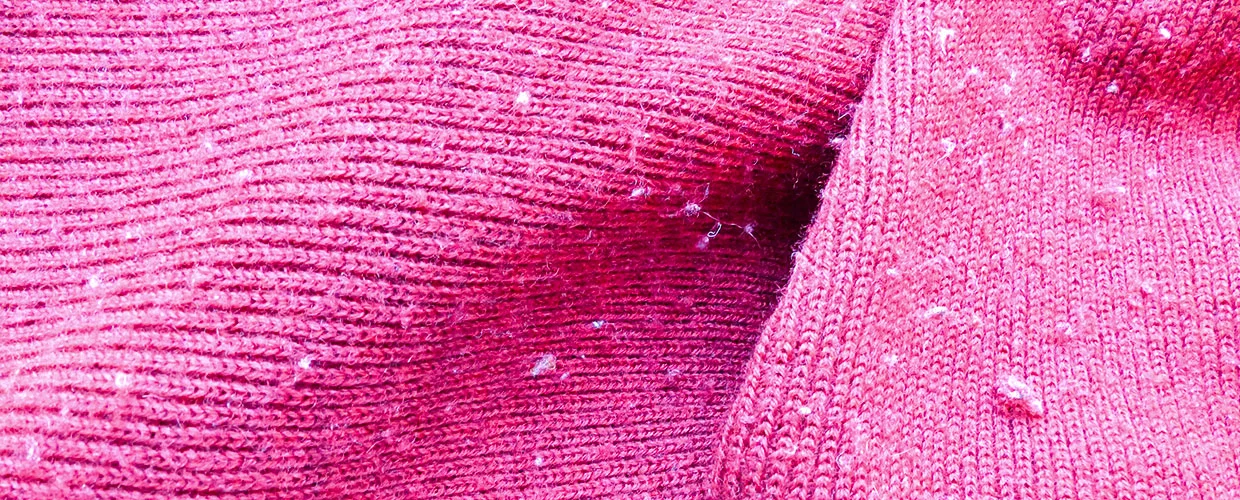 pinker Wollstoff mit Pilling