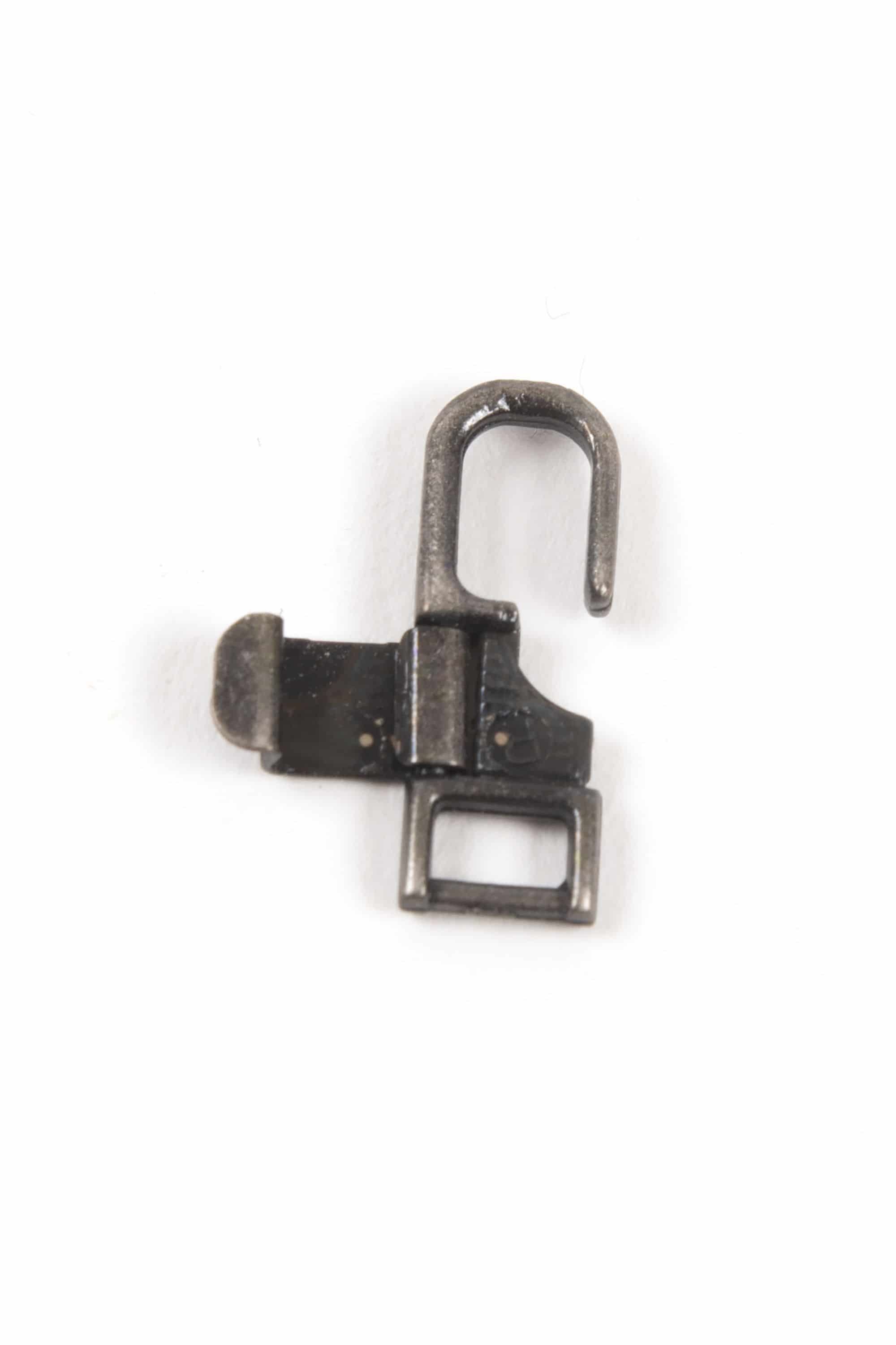Zipper-Zwischenglied schwarz Zipper Zwischenglied in schwarz aus Metall, Freisteller