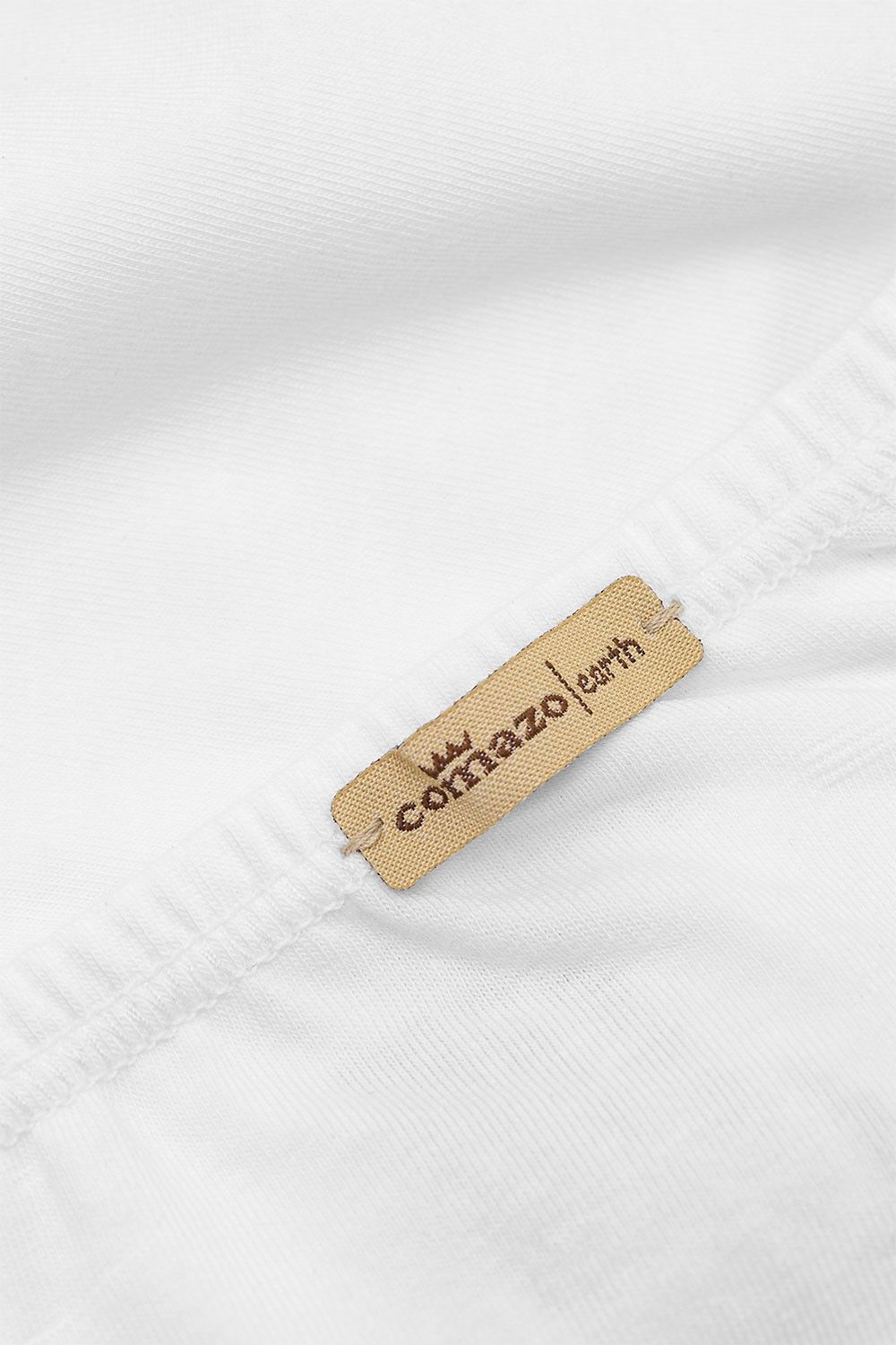 Nahaufnahme vom Etikett der weißen Damen Unterhose aus bio Baumwolle (kbA) und Elasthan